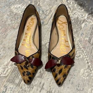 Sam Edelman Cowhair Animal Print Flats with patent leather bow detail
